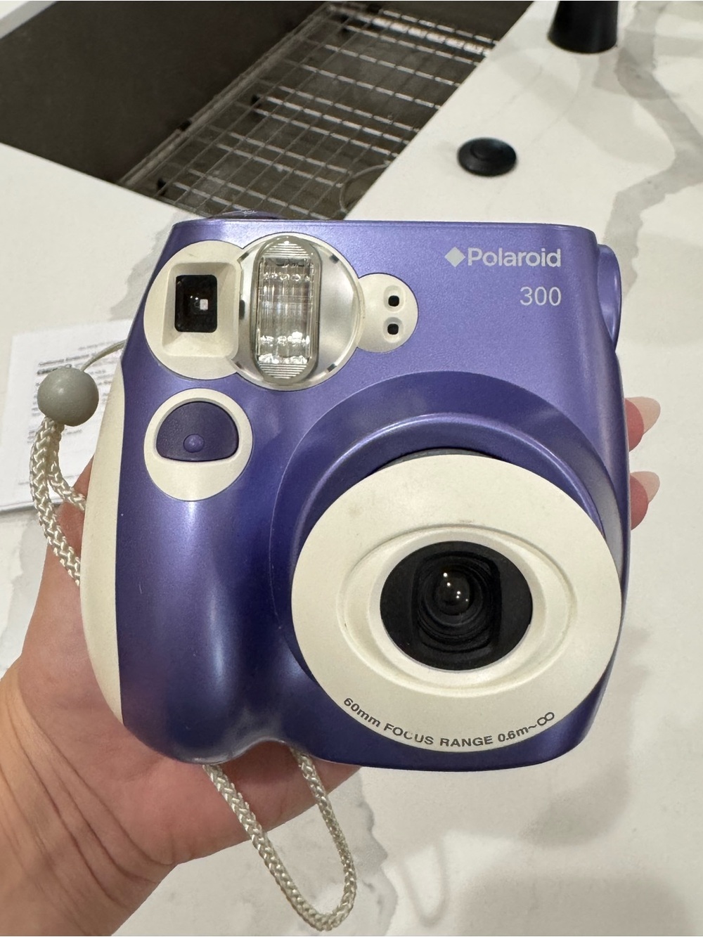 Polaroid 300 Instant Camera in Purple and White